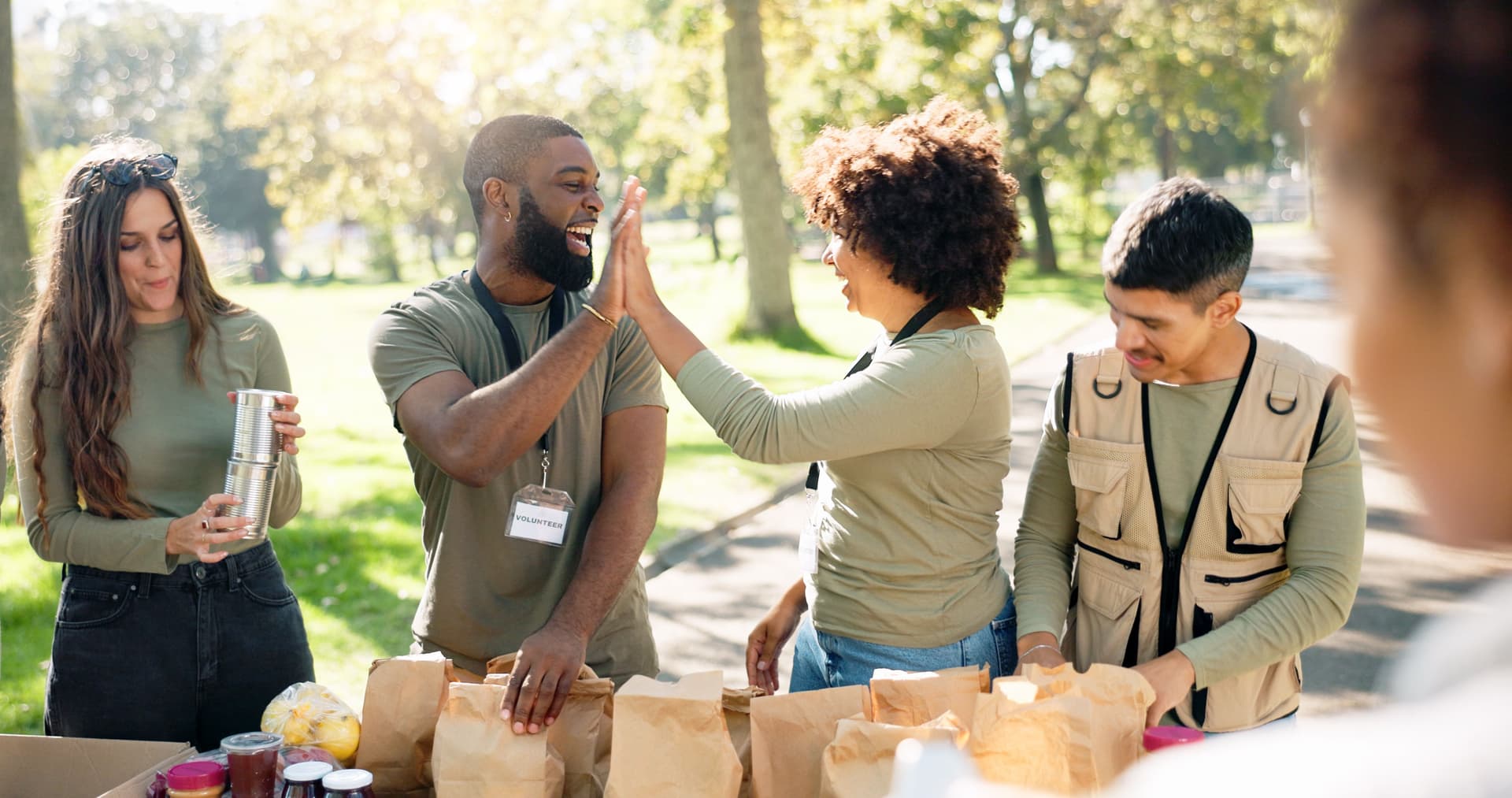 Volunteers sharing food with neighbors